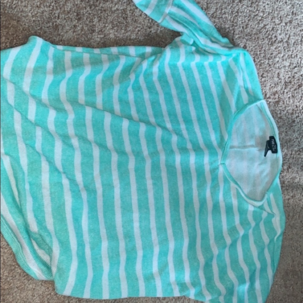 Green and striped white long sleeve shirt